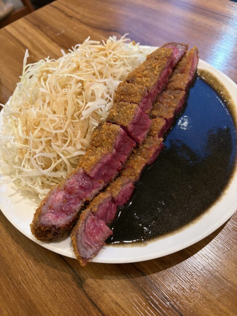 Beef Katsu in Yeonnam-dong: Yoshokuya Kou Review Near Hongdae Rare-centered beef katsu showing the pink interior at Yoshokuya Kou