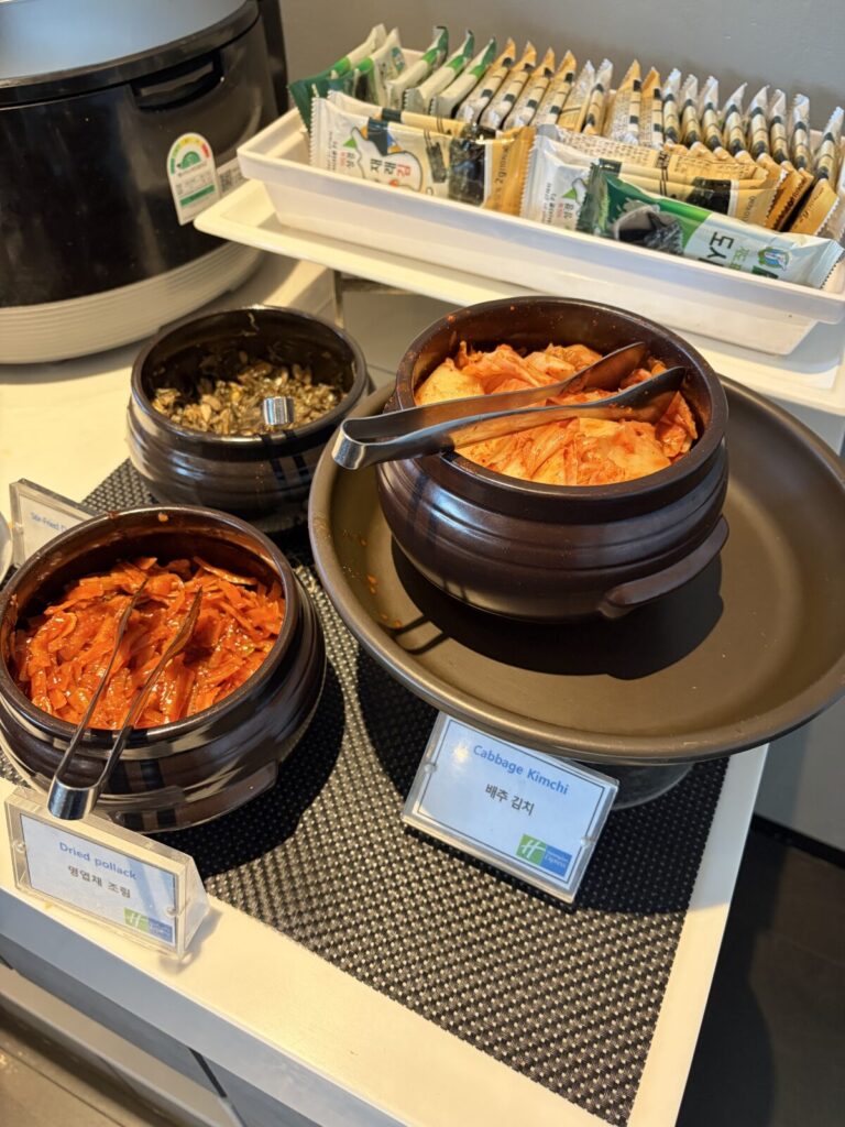 Holiday Inn Express Seoul Hongdae Breakfast Review: My Honest Experience Korean side dishes including kimchi and roasted seaweed at the breakfast buffet