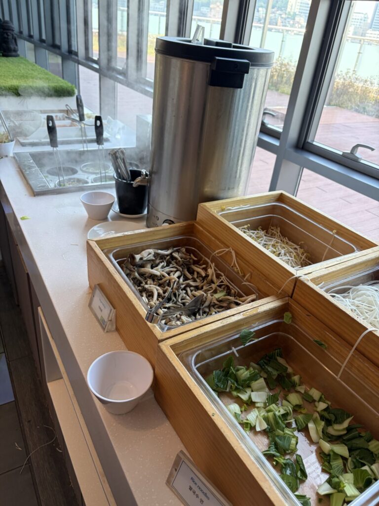 Holiday Inn Express Seoul Hongdae Breakfast Review: My Honest Experience Fresh vegetables and rice noodles prepared for the live noodle station