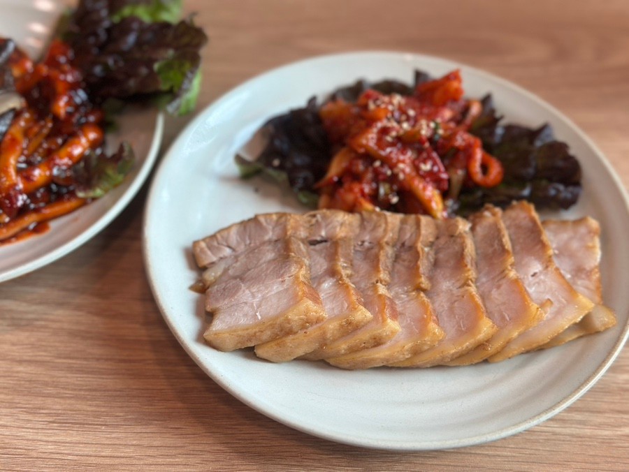 Traditional Korean Ssambap Near Hongdae | Yeonnam-dong Review Korean bossam with steamed pork and kimchi